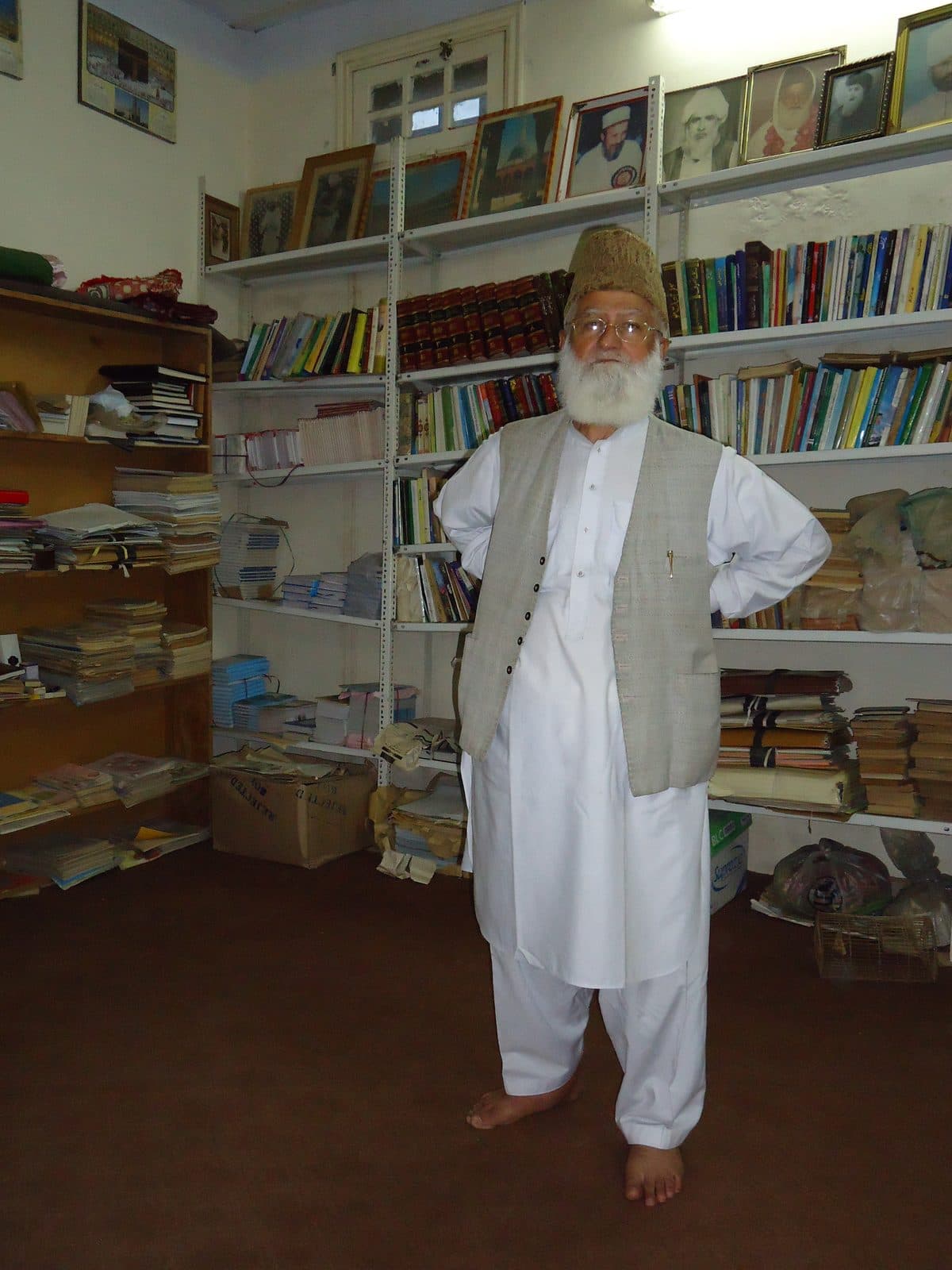 Among the bookshelves.